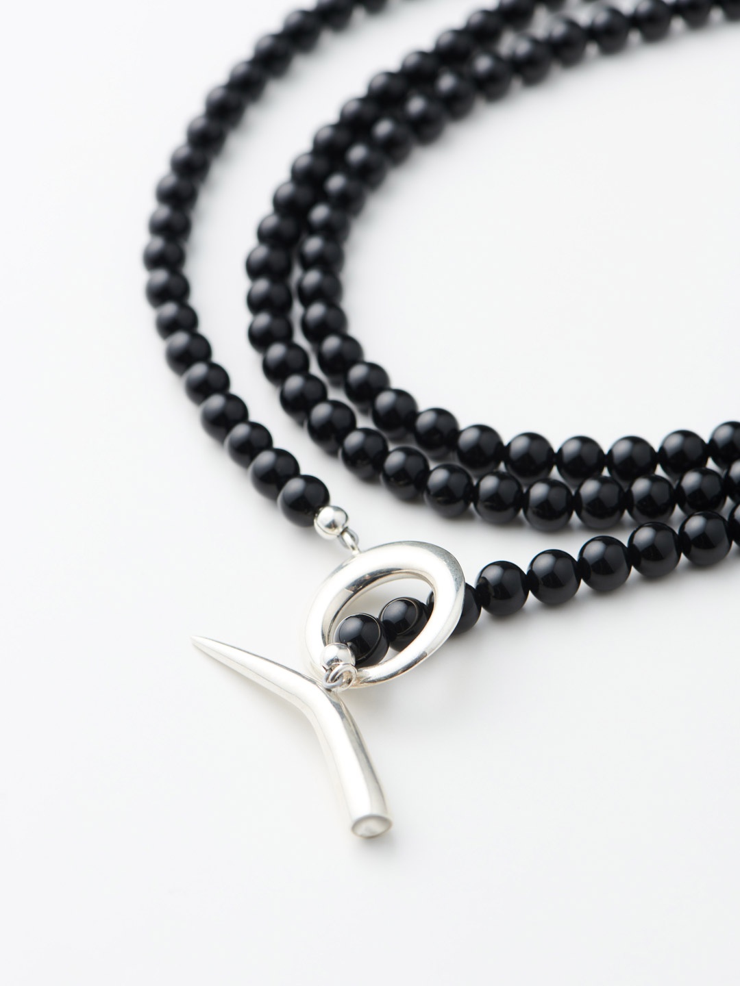 Onyx Man Ray Necklace - Silver